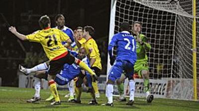 A falling Nicolas Anelka, centre, scores his second goal for Chelsea against Watford.