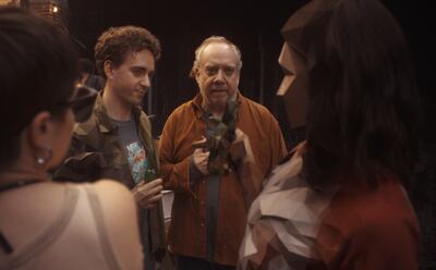 Declan Mason, left, and Paul Giamatti in Black Mirror season seven. Photo: Netflix