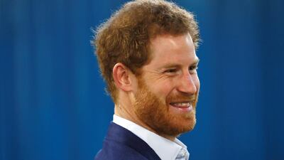 Prince Harry talks to medical staff as part of the Heads Together campaign at the London Ambulance Service in central London. Stefan Wermuth / Reuters