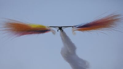 A plane flies during the Lusail Sky Festival in Lusail, Qatar. Reuters