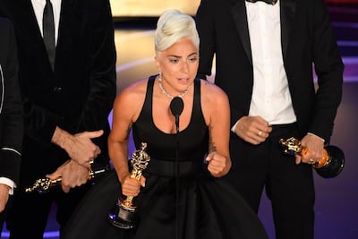 Lady Gaga accepting her Best Original Song Oscar of 'Shallow' from 'A Star is Born'. AFP