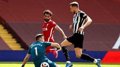 Liverpool's Mohamed Salah sees his shot saved by Newcastle goalkeeper Martin Dubravka. PA