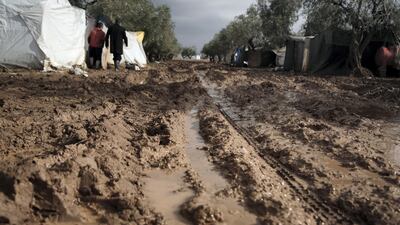 Location: Al-Karama camp in Atama. The aftermath of heavy rainfall on north Syria, residents lost their furniture, clothes and bedding as well as the tents waiting outside in open lands until the civil defense and NGs arrive to rescue them.