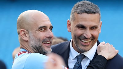 Pep Guardiola hugs Manchester City chairman Khaldoon Al Mubarak after they are crowned Premier League champions on May 21, 2023. City won a historic treble of league, FA Cup and Champions League in the 2022/23 season. Getty Images