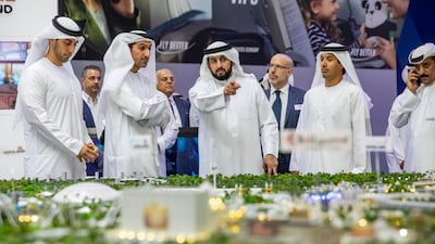 Sheikh Ahmed bin Mohammed, chairman of the Mohammed bin Rashid Al Maktoum Knowledge Foundation, centre, married Sheikha Midya bint Dalmouj Al Maktoum.