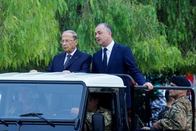 Deputy Speaker Elias Bou Saab (R) is among those leading initiatives to find a successor to Michel Aoun (L). Reuters