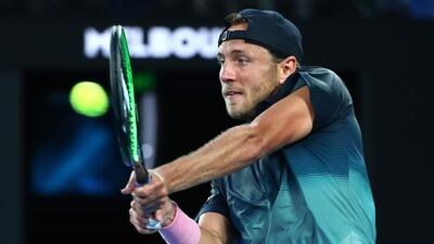 Lucas Pouille plays a backhand. Getty Images