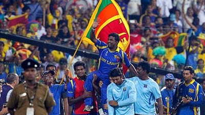 Muttiah Muralitharan is held aloft by Sri Lankan players after his last game in the country on Tuesday – a semi-final victory over New Zealand in the World Cup. Next up is India today.