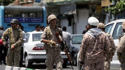 Members of the Iranian Revolutionary Guard secure the area outside the Iranian parliament during an attack on the complex in Tehran on June 7, 2017. Hossein Mersadi / Fars News / AFP