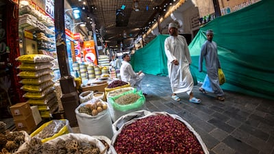 Shoppers at the Dubai Spice Souq. Businesses in the UAE reported an improvement in customer activity in August. Victor Besa / The National