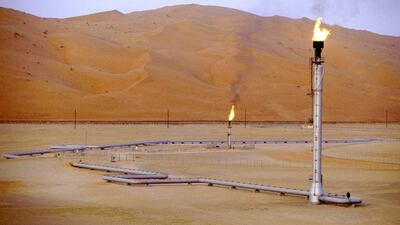 Flare stacks burn at the Saudi Aramco oilfield complex at Shaybah in the Rub’ Al Khali desert. Up to 5 per cent of the company is expected be sold, possibly raising tens of billions of dollars. Reza / Getty Images