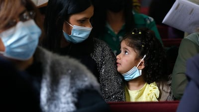 Palestinian Christians attend the Palm Sunday mass at the Roman Catholic church of the Holy Family in Gaza City. AFP
