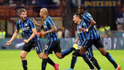 Inter Milan players celebrate a goal during their midweek Serie A win over Verona on Wednesday. Matteo Bazzi / EPA / September 23, 2015