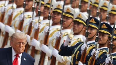 Donald Trump inspects an honour guard during the welcome ceremony at the Great Hall of the People. EPA