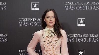 Dakota Johnson wears Gucci to the Fifty Shades Darker premiere in Madrid. Courtesy of Gucci by IPA