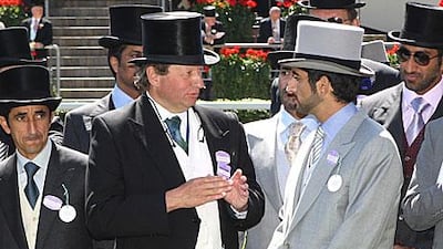 The horses of Sheikh Hamdan bin Rashid, centre right, provide Mark Johnston, centre left, with plenty of winners.