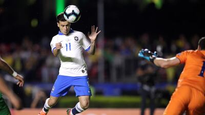 Brazil's Philippe Coutinho scores their second goal. Reuters