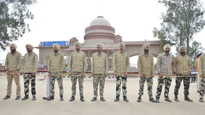 Indian police stand guard near the crossing. AFP