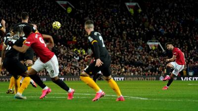Bruno Fernandes, right, shoots at goal on his Manchester United debut in the 0-0 draw against Wolves at Old Trafford. Reuters