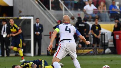 Colombia's James Rodriguez, left, in pain next to USA's Michael Bradley during their Copa America match in Santa Clara, California, United States, on June 3, 2016. AFP / JOSH EDELSON