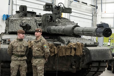 British Army servicemen with a Challenger 2 at Tapa military camp, Estonia. EPA