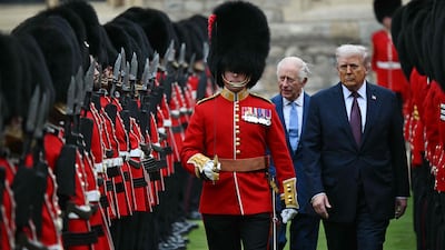 King Charles III and US President Donald Trump inspect the guard of honour at Windsor Castle. AFP