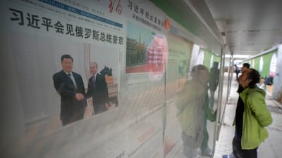 Mr Xi's visit to Russia made big headlines in Beijing. AP