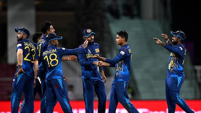 Sri Lanka's players celebrate after the dismissal of Australia's Josh Inglis. AFP