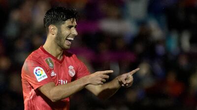 Real Madrid's Spanish midfielder Marco Asensio celebrates his goal against Melilla. AFP
