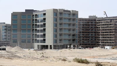 Residential buildings under construction in Dubai South. Pawan Singh / The National