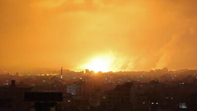 An explosion during an Israeli air strike on Beit Lahia in northern Gaza on Friday. AFP / Mohammed Abed