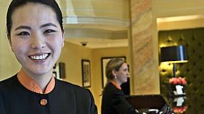 Sunhwa Shin, who is originally from South Korea, works as a receptionist in London.