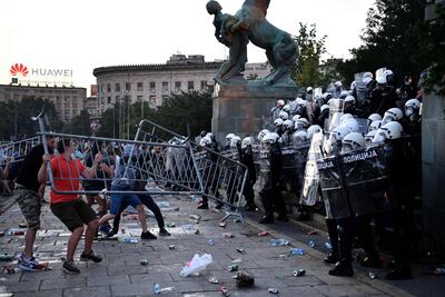 Protesters face police in Belgrade on July 8, 2020 as clashes erupt. AFP