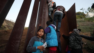 Migrants from Central America at the border with the US in Tijuana, Mexico. Reuters