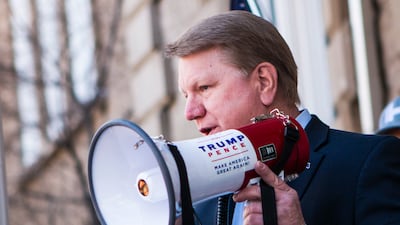 Former Nevada Assemblyman Jim Marchant addresses a crowd in front of the Nevada Capitol in Carson City. AP