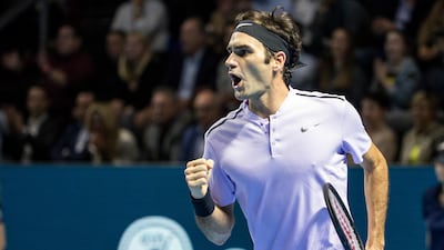 Roger Federer celebrates a point against Juan Martin del Potro at the Swiss Indoors tournament in Basel, Switzerland. Alexandra Wey / AP Photo