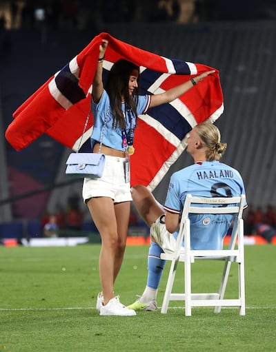 Erling Haaland and his girlfriend Isabel Johansen celebrate. Getty Images