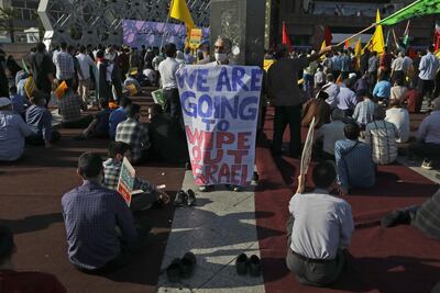 A demonstrator holds an anti-Israeli placard in a pro-Palestinians gathering in Tehran last month. AP Photo