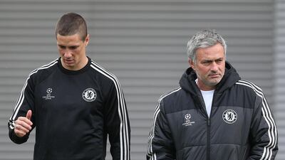 Chelsea manager Jose Mourinho, right, chats with Fernando Torres during a training session ahead of their Uefa Champions League Group E match against Schalke on October 21, 2013, in Cobham, England. Charlie Crowhurst / Getty Images