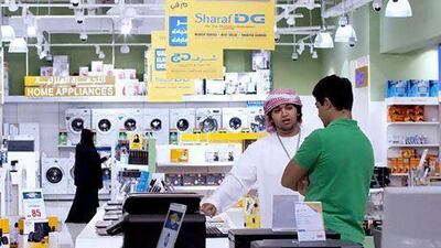 A new credit card from Emirates Islamic Bank offers rewards at retailers including Sharaf DG electronics stores. Christopher Pike / The National