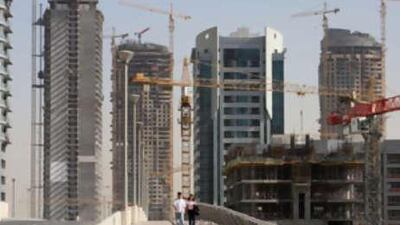 Dubai Marina under construction. Developers such as Aldar, Nakheel, Sorouh and Union Properties have low debt to equity ratio and rely less on bank loans than second tier developers to raise capital.