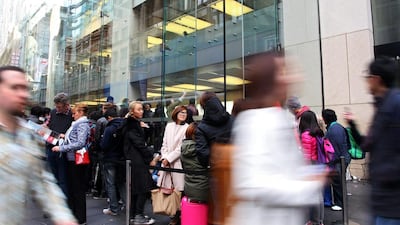 Customers wait in line outside the Apple Inc George Street store in Sydney. Lisa Maree Williams / Bloomberg