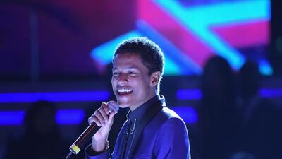 Cody Wise: Proving you don’t have to spend a fortune to look fab, 18-year-old Cody Wise wore a Topman suit of midnight blue to the Global Gift Gala at DIFF 2014. Instead of a tie, the singer chose a black shirt with a chained pin through the lapels. Wise completed his look, as did many other chaps on the red carpet, with a smart pair of black patent Oxford shoes. http://www.topman.com/ Gareth Cattermole / Getty Images for DIFF