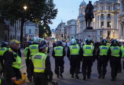 Police officers at a protest in Westminster, London, following the fatal stabbing of three children at a Taylor Swift-themed holiday club on Monday in Southport. PA