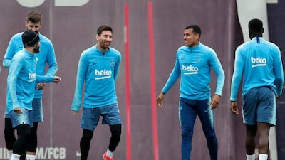 Lionel Messi, third left, takes centre stage in Barcelona's training session on Friday ahead of their Copa del Rey final with Valencia on Saturday. AP Photo