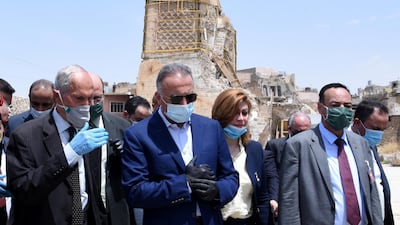 Prime Minister Mustafa Al Kadhimi visits the Great Mosque of al-Nuri in the Old City area, on the west side of Mosul city, northern Iraq, 10 June 2020. EPA