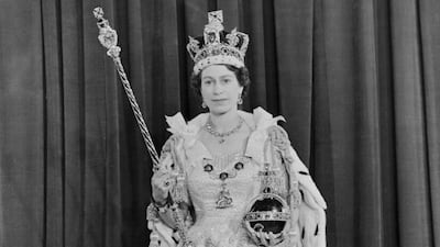 Queen Elizabeth II holding the royal sceptre after her coronation. Getty
