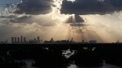 Clouds over Abu Dhabi City taken from Sheikh Khalifa bin Zayed Al Nahyan highway in Abu Dhabi. Pawan Singh / The National