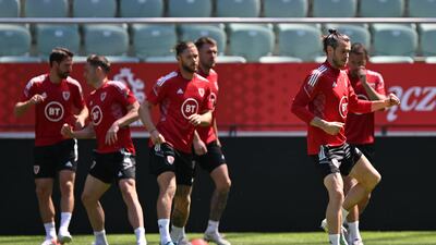 Wales's Gareth Bale, right, during the team's training session in Wroclaw, Poland, on May 31, 2022, ahead of their Uefa Nations League clash with Poland on Wednesday, June 1. EPA