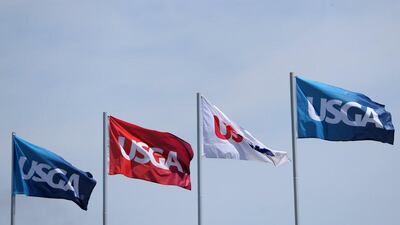 USGA flags fly at Oakmont Country Club on Monday. Sam Greenwood / Getty Images / AFP / June 13, 2016